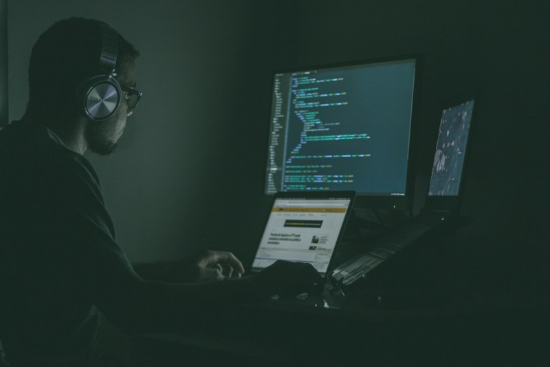 Programmer coding at night